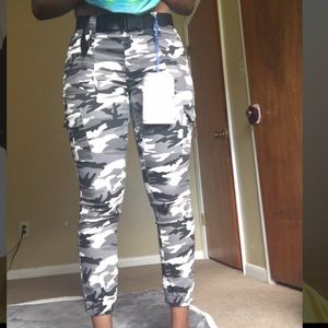 Brand new grey, black, and white camo jeans.